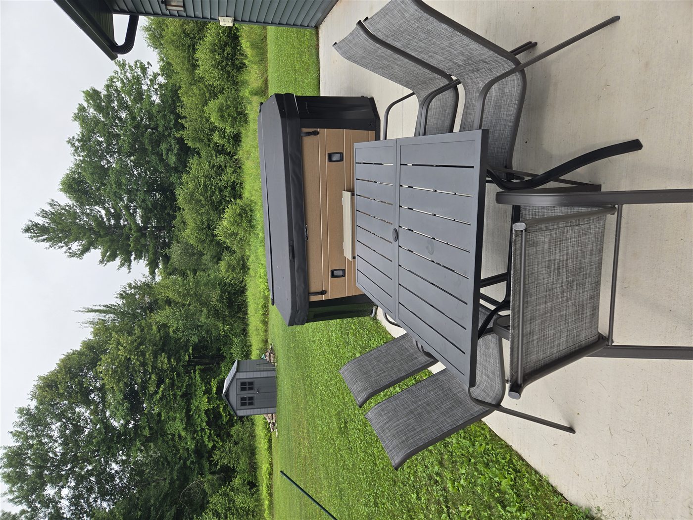 Covered patio dining area at Northern Lights Aurora