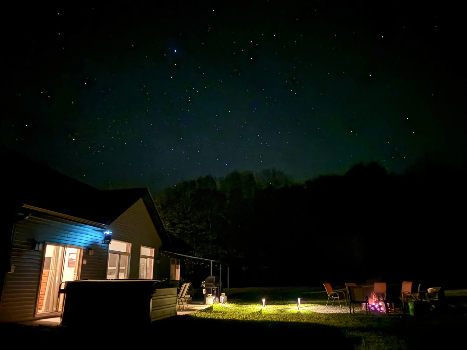 Star-filled night sky over the Northern Lights Aurora backyard